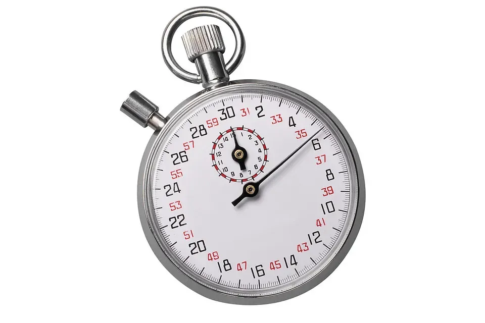 A chrome mechanical stopwatch on a white background